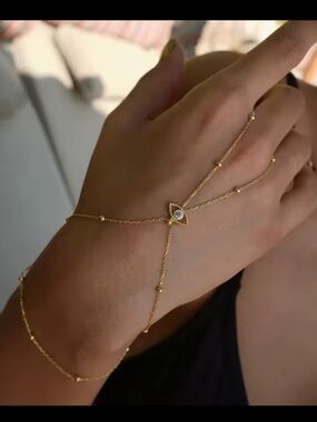 Anthropologie Gold Hand Chain Bracelet with Clear Crystal